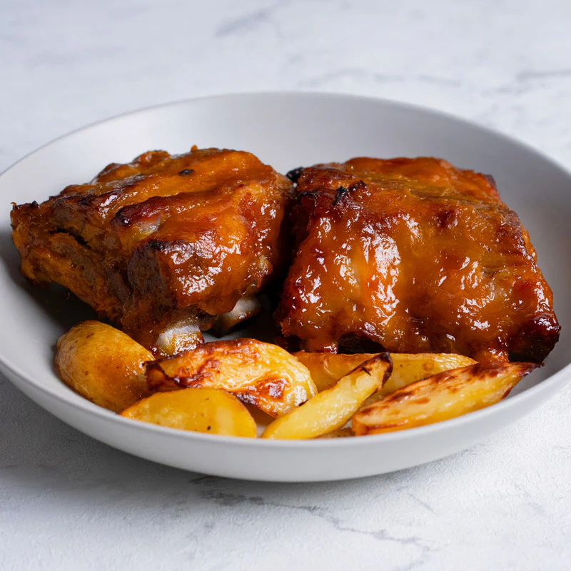 Costilla en salsa de mango con patatas